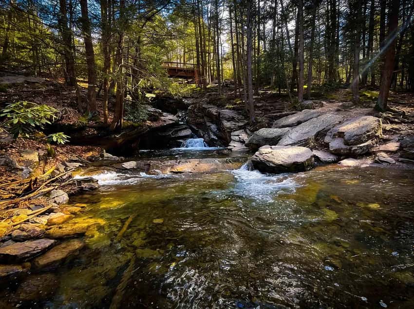 Glacial pothole waterfall at Seven Tubs Nature Area near Wilkes-Barre, Pennsylvania, showing Wheelbarrow Run cascading through sandstone formations