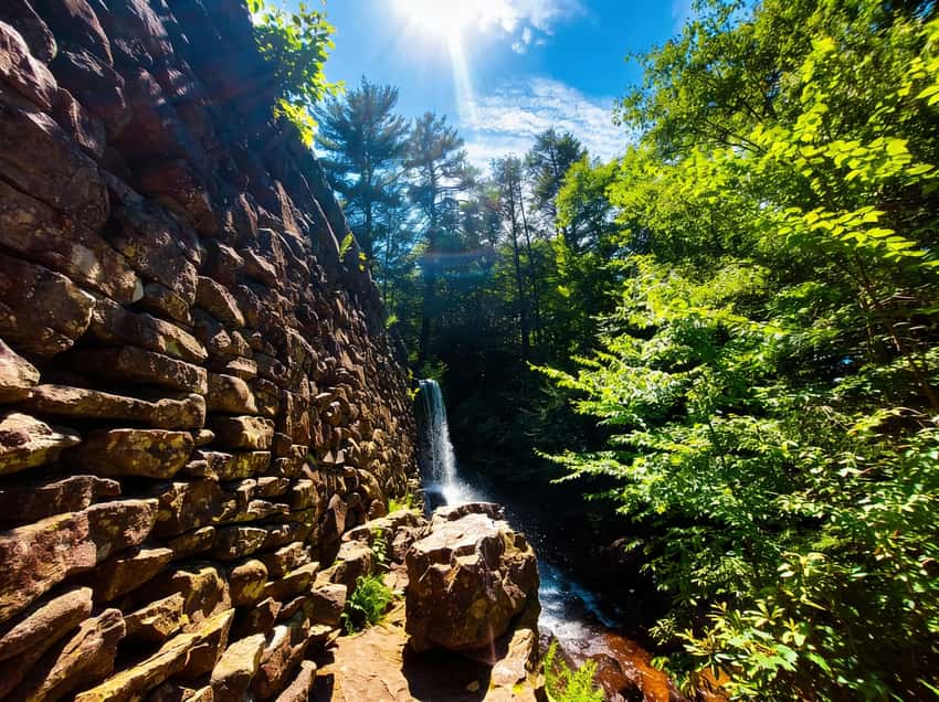 Side view of the impressive Stametz Dam waterfall on the Shades of Death trail